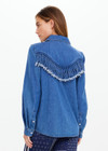 THE UPSIDE women's blue Wildwest Sylve Fringe Shirt is made from organic cotton. The chambray shirt features frayed fringing and pearlised snap buttons. Designed for lifestyle wear.