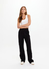 THE UPSIDE women's black Monte Pant is made from a lenzing viscose soft suiting fabrication. This high waisted wide leg pant features an elastic waistband, stripe tape down the side seams, and side seam and back patch pockets. Designed for leisure and recovery.