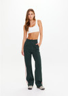 THE UPSIDE women's dark green Monte wide leg, high waisted trackpant features an elastic waistband, side stripes, and front and back pockets.