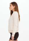 THE UPSIDE women's natural Canyon Isabeli Knit Cardigan is made from organic cotton. The buttoned up cardigan features ribbed hem, cuff and neck. Designed for lifestyle wear.