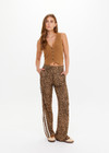 THE UPSIDE women's brown Babylon Button Knit Vest is made from organic cotton. The knitted vest features button-down front. Designed for layering and lifestyle wear.