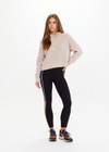 THE UPSIDE women's natural Dune Knit Hoodie is made from organic cotton. The relaxed fit hoodie features soft ribbed hem and cuffs. Designed for comfort.