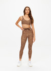 THE UPSIDE women's leopard Panthera 25 inch Midi Pant is made from recycled peached. The soft legging features a drawstring. Designed for yoga and pilates.