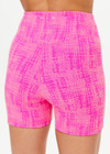 THE UPSIDE women's pink Nevada 4 inch Spin Short is made from specialty fabric. The high rise bike short features v panel waistband. Designed for yoga and pilates.
