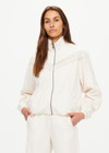 THE UPSIDE women's natural Bow n Arrow Fringe Zip Jacket is made from jacquard. The zip up jacket features elasticated cuffs and hem. Designed for comfort.