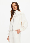 THE UPSIDE women's natural Bow n Arrow Fringe Zip Jacket is made from jacquard. The zip up jacket features elasticated cuffs and hem. Designed for comfort.