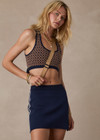 THE UPSIDE women's beige and navy geometric print Crossroad Alma Knit Crop Top is made with an organic cotton blend knit jacquard and features a scoop neckline.