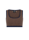 THE UPSIDE women's beige and navy geometric print Crossroad Alma Knit Crop Top is made with an organic cotton blend knit jacquard and features a scoop neckline.