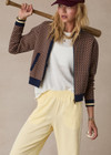 THE UPSIDE women's beige and navy geometric print Crossroad Margot Knit slim fit Jacket is made with an organic cotton jacquard and feature front welt pockets.