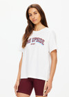 THE UPSIDE women's white Alumni Jodhi Tee is made with organic cotton jersey and is designed with a classic crew neck shape with a logo across the chest.THE UPSIDE women's white Alumni Jodhi Tee is made with organic cotton jersey and is designed with a classic crew neck shape with a logo across the chest.