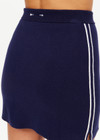 THE UPSIDE women's navy Eternity Zelma Knit Mini Skirt is made with organic cotton and features cream side stripes and mini splits at the hem.