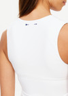 THE UPSIDE women's white Kori Scoop Neck Crop Tank is made from recycled peached. The high coverage sports tank top features removable cups. Designed for yoga, pilates and barre.