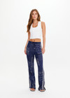 THE UPSIDE women's navy blue paisley Vaquero Roma Pant is made from viscose and rayon. The highwaisted track pants features side stripe detailing. Designed for lifestyle wear.