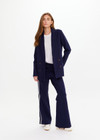 THE UPSIDE women's navy Double Breasted Blazer is made from lenzing viscose. The women regular fit blazer features flap pockets and leopard printed lining.