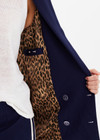 THE UPSIDE women's navy Double Breasted Blazer is made from lenzing viscose. The women regular fit blazer features flap pockets and leopard printed lining.