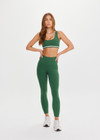 THE UPSIDE women's green Il Pelicano Scoop Bra is made from recycled rib. The scoop neck sports bra features removable cup. Designed for yoga and exercise.