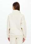 THE UPSIDE women's white organic cotton Hamilton Wren Half Zip Sweater is designed for a regular fit and features a embroidered horseshoe logo. Perfect for everyday.