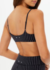 THE UPSIDE women's jacquard pinstripe Zenith Ballet Bra features is a low coverage sports bra with soft support and elastic adjustable straps. Perfect for pilates & yoga.