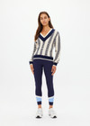 THE UPSIDE women's cream and navy check Sonny V Neck Sweater is a classic V neck knit in organic cotton. The perfect wardrobe addition.