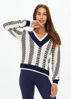 THE UPSIDE women's cream and navy check Sonny V Neck Sweater is a classic V neck knit in organic cotton. The perfect wardrobe addition.