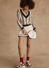 THE UPSIDE women's cream and navy check Sonny V Neck Sweater is a classic V neck knit in organic cotton. The perfect wardrobe addition.