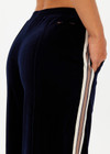 THE UPSIDE women's navy Monaco Freya Wide Leg Pant is a soft recycled velour fabric with side seam pockets and an elasticated waistband. The perfect travel pant.