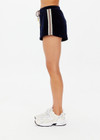 THE UPSIDE women's navy Monaco Helena Short features a soft recycled velour fabric in a relaxed short shape with elasticated wasitband. The perfect travel piece.