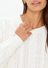 THE UPSIDE women’s off white Espada Talia cable knit sweater is made in a relaxed fit from chunky organic cotton and features a crew neck and ribbed neckline, cuff and hem.