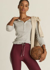 THE UPSIDE women's grey marle organic cotton Ness Ribbed Long Sleeve Top is designed for a slim fit. Perfect for layering and styling up and down.