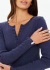 THE UPSIDE women's navy organic cotton Ness Ribbed Long Sleeve Top is designed for a slim fit. The perfect piece for layering and styling up or down.