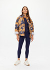 THE UPSIDE women's floral Aruba Quilted Nicola Jacket is designed for an oversized fit and features patch pockets and antique brass zipper. Made for lifestyle.