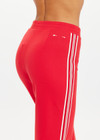 THE UPSIDE women's red Muse Flare Pant is designed for a mid to low rise fit with side seam pockets in a soft suiting fabrication. The perfect everyday or travel pant.