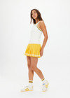 THE UPSIDE women's cream Kristy Rib Tank Top is made in recycled moisture wicking ribbed fabrication with striped rib neckband and armhole. Made for tennis.