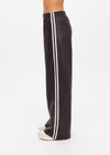 THE UPSIDE women's brown recycled fabric Vegan Leather Twilight Pant features an elasticated waistband with contrast white binds down the side. The perfect addition to your everyday wardrobe.