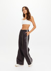 THE UPSIDE women's brown recycled fabric Vegan Leather Twilight Pant features an elasticated waistband with contrast white binds down the side. The perfect addition to your everyday wardrobe.