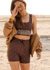 THE UPSIDE women's paisley recycled peached Mikkola Lou Scoop Crop is designed for a supportive fit and features internal shelf bra with removable cups. Made for yoga, pilates, barre.