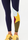 THE UPSIDE women's navy recycled peached Starburst 25in Legging is designed for a supportive fit and features a drawcord waist. Made for yoga and pilates.