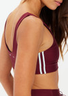 THE UPSIDE women's merlot Oxford Harley Scoop Sports Bra is designed for supportive fit and features elasticated underbust and removable cups. Made for pilates.