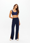 THE UPSIDE women's navy Vitesse Marnie Wide Leg Pant in slinky fabrication featuring a high rise elasticated waistband, drawcord and side seam pockets. Ideal for everyday leisure.