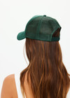 THE UPSIDE women's green Stardust Trucker Hat features a foam front and mesh back with an adjustable snapper.