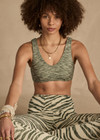 THE UPSIDE women's green Reversible Isaac Bra is designed for a soft & supportive fit in a recycled fabric and features a V neckline. Made for yoga & pilates.