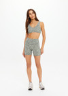 THE UPSIDE women's green Reversible 5inch Spin Short is designed for a soft & supportive fit in a recycled fabric and features embroidered arrow logo on back. Made for yoga & pilates.