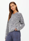 THE UPSIDE women's blue marle organic cotton linen Armada Skylar V Neck Sweater is a relaxed fit and features a V neckline and ribbed cuffs. Made for everyday leisure.
