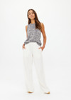 THE UPSIDE women's cream recycled cotton Soho Tokio Wide Leg Pant is designed for a relaxed fit and features an elasticated waistband and front pockets. Made for everyday leisure.