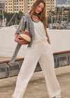 THE UPSIDE women's cream recycled cotton Soho Tokio Wide Leg Pant is designed for a relaxed fit and features an elasticated waistband and front pockets. Made for everyday leisure.