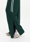 THE UPSIDE women's green Cobra Zephyr Wide Leg Pant comes in a soft fabrication with an elasticated waistband and welt pockets. Made for everyday leisure.