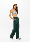THE UPSIDE women's green Cobra Zephyr Wide Leg Pant comes in a soft fabrication with an elasticated waistband and welt pockets. Made for everyday leisure.