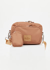 THE UPSIDE women's tan recycled fabric Odyssey Crossbody Bag features an adjustable and removable strap, multiple zippered pockets and silver hardware.