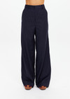 THE UPSIDE women's navy pinstripe merino Wool Mira Wide Leg Pant features a flat waistband with belt loops and side pockets.