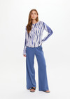 THE UPSIDE women's blue and white tie dye Amana long sleeve lightweight knit top is made from 100% organic cotton. Designed for layering and lifestyle wear.